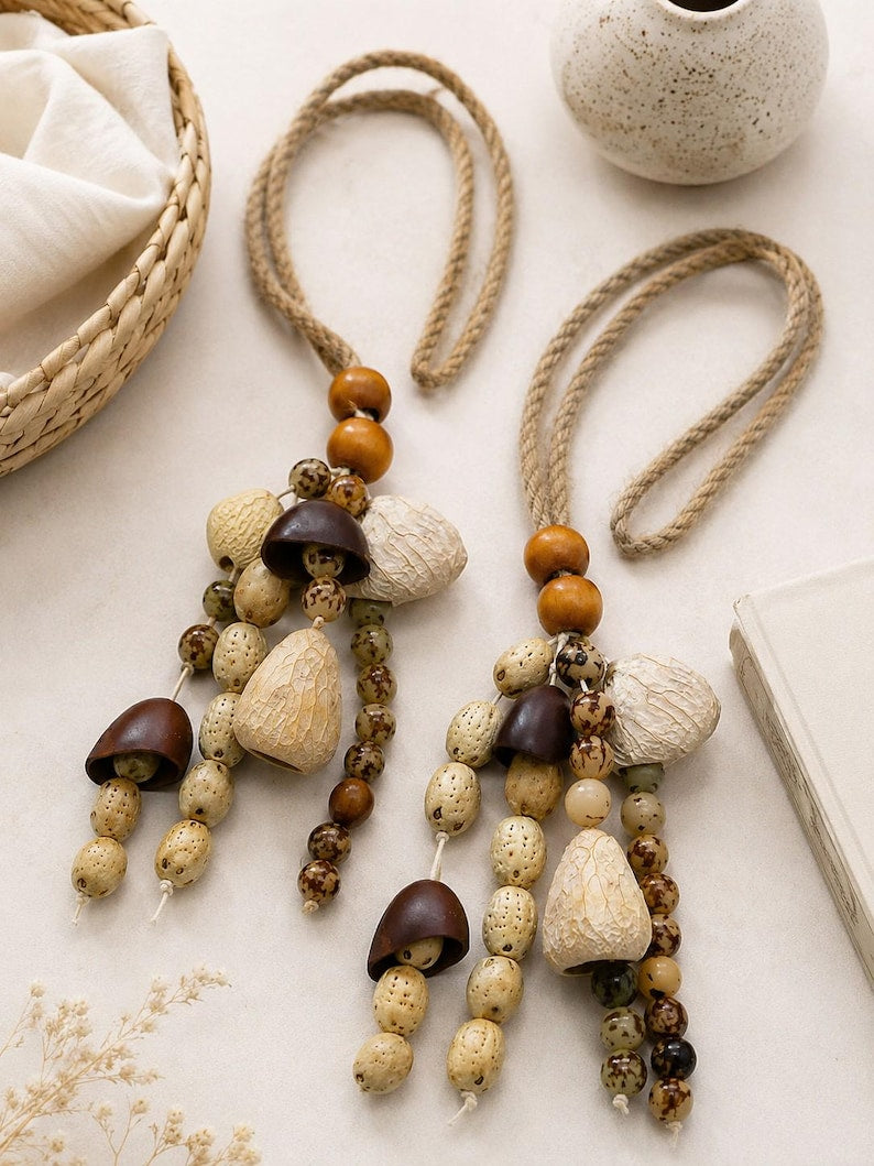 Bohemian-style curtain tie-back made of natural wood beads and cord