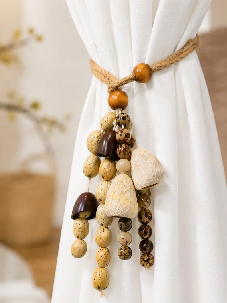 Bohemian-style curtain tie-back made of natural wood beads and cord